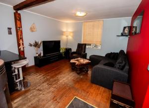 Un televizor și/sau centru de divertisment la Videviku Home