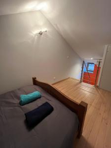 En eller flere senge i et værelse på Au cœur de Paray- Quartier historique