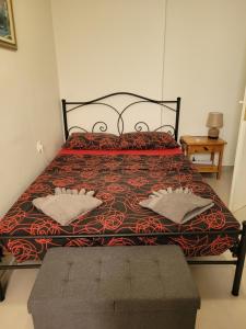 Ένα ή περισσότερα κρεβάτια σε δωμάτιο στο Maria Apartment