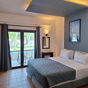 Postel nebo postele na pokoji v ubytování Skiathos Holiday Resort + 154 fotografií