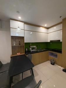 Kuchyň nebo kuchyňský kout v ubytování Moon Homestay 0308