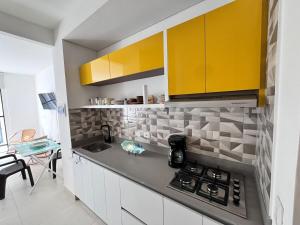 Kuchyň nebo kuchyňský kout v ubytování Apartamento junto a la playa y con vista al mar