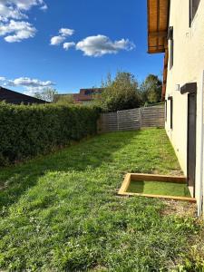 Κήπος έξω από το T3 neuf de 62m2 avec jardin axe Annecy-Geneve +1 φωτογραφίες