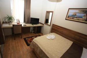 Postel nebo postele na pokoji v ubytování My Rose Hotel