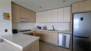 Η κουζίνα ή μικρή κουζίνα στο Nuevas Casas Familiares +22 φωτογραφίες