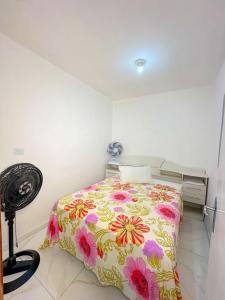 Postel nebo postele na pokoji v ubytování Torres Residence