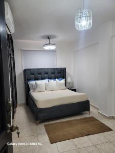 Katil atau katil-katil dalam bilik di Apartamento dos dormitorios en la zona colonial