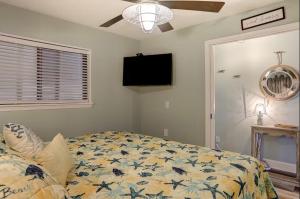 Voodi või voodid majutusasutuse Ocean Dunes 208 toas