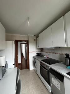 Η κουζίνα ή μικρή κουζίνα στο Apartamento saron