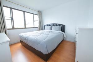 Ένα ή περισσότερα κρεβάτια σε δωμάτιο στο 2Bed Room Condo Near iConsiam & BTS Krungthonburi