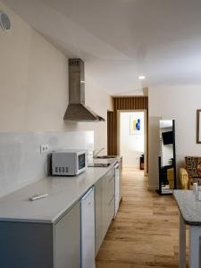 Η κουζίνα ή μικρή κουζίνα στο Carvalha Espigueiro - Arcos de Valdevez