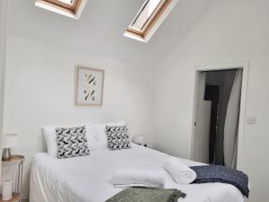 Ένα ή περισσότερα κρεβάτια σε δωμάτιο στο Rose's Cottage, Bucks Mills