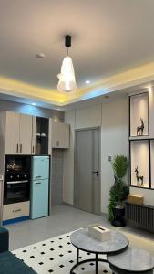 Η κουζίνα ή μικρή κουζίνα στο Sky homes ogbojo