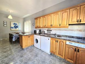 Køkken eller tekøkken på Apartamentos Medano - Casa Playa