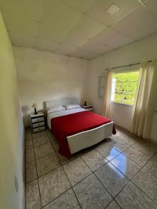 Ένα ή περισσότερα κρεβάτια σε δωμάτιο στο Casa Quinta La Armonia +4 φωτογραφίες