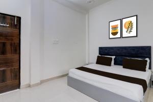 Postel nebo postele na pokoji v ubytování HOTEL O CR GRAND