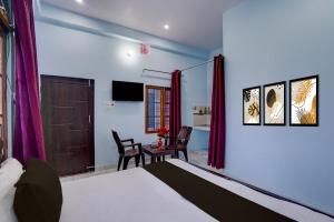 Μια τηλεόραση ή/και κέντρο ψυχαγωγίας στο Hotel O AK PALACE