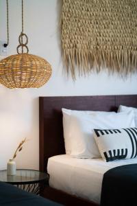 a bedroom with a bed and a glass table at La Veleta Hotel - Pool Access Room in Tulum