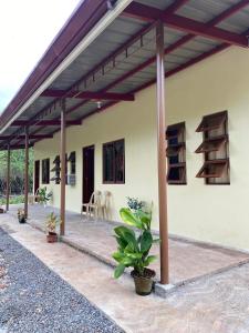 a patio with awning on a house at Panglao Transient house close to nature with bonfire in Panglao
