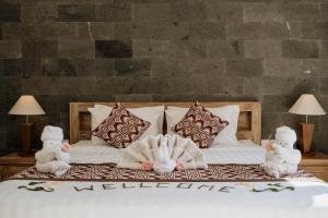Postel nebo postele na pokoji v ubytování Legonsari villa + 24 fotografií