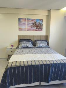 Katil atau katil-katil dalam bilik di Flat Paiva sol e mar