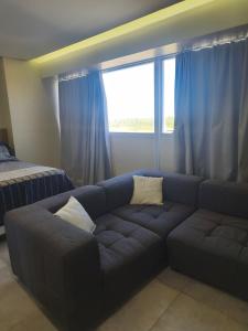Ruang duduk di Flat Paiva sol e mar +6 gambar