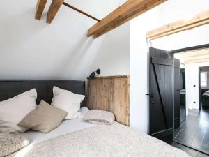 Ένα ή περισσότερα κρεβάτια σε δωμάτιο στο Luxurious holiday home Room No 35