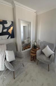 Istumisnurk majutusasutuses Boutique Coastal Retreat for Couples or Singles