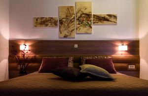 Postel nebo postele na pokoji v ubytování Villa Martini - apartments & rooms