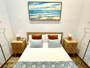 Ένα ή περισσότερα κρεβάτια σε δωμάτιο στο Charming and Ample Studio, 3 mins from Calle Larios, in the heart of Málaga Centre