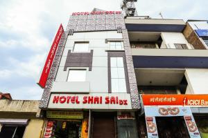 a building with a hotel shahi skills sign on it at Hotel O Shri Sai in New Delhi +41 photos