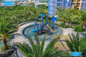a water park at a resort with a water slide at Sea Breeze Apartment The Sóng-View Biển & Hồ Bơi Resort Vũng Tàu in Vung Tau +111 photos