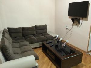 TV o dispositivi per l'intrattenimento presso Mari Guest House