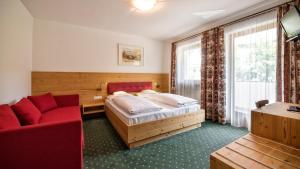 Voodi või voodid majutusasutuse Hotel Elisabeth toas