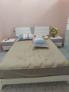 Кровать или кровати в номере Moari Homestay Fuvahmulah