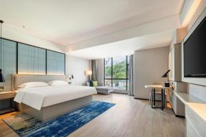 Postel nebo postele na pokoji v ubytování Echarm Hotel Baise Xilin + 249 fotografií