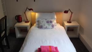 Voodi või voodid majutusasutuse St. Aiden's Guesthouse toas