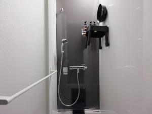 a shower stall in a bathroom with a sink at Enza - Vacation STAY 69573v in Katori +58 photos