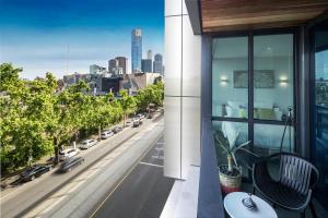 a view from a balcony of a building with a view of a city at Boutique Abode 316 in Melbourne