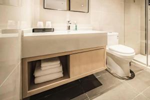 Ένα μπάνιο στο City Comfort Inn Wuhan Yangluo Wanda Plaza +211 φωτογραφίες
