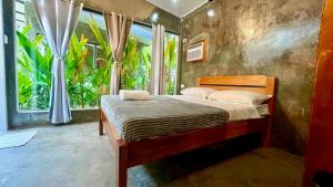 Katil atau katil-katil dalam bilik di Small quiet private house