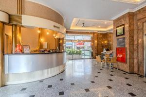 a lobby with a bar and a restaurant at Retro Kaohsiung in Kaohsiung