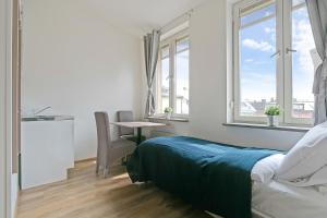 Postel nebo postele na pokoji v ubytování Hotel Kringelstaden