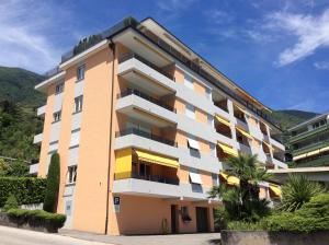 a building with a lot of balconies on it at Bellavista in Locarno