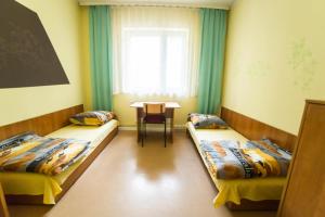 Postel nebo postele na pokoji v ubytování Ondraszka