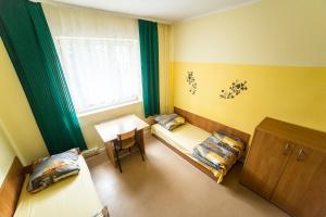 Postel nebo postele na pokoji v ubytování Ondraszka