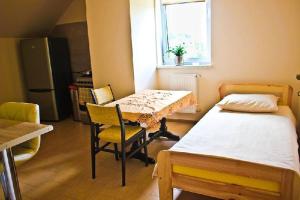 Ένα ή περισσότερα κρεβάτια σε δωμάτιο στο dom Bartków kielce +40 φωτογραφίες