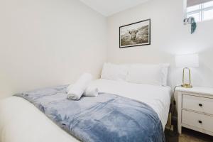 Postel nebo postele na pokoji v ubytování Modern Stay in the Heart of Melbourne