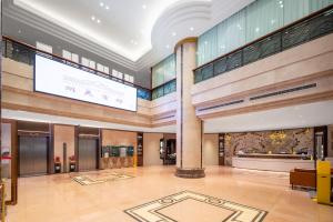 Photo de la galerie de l'établissement Guangzhou Hutian Hotel, à Canton 55 autres photos