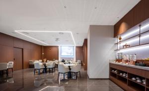 Photo de la galerie de l'établissement Guangzhou Hutian Hotel, à Canton